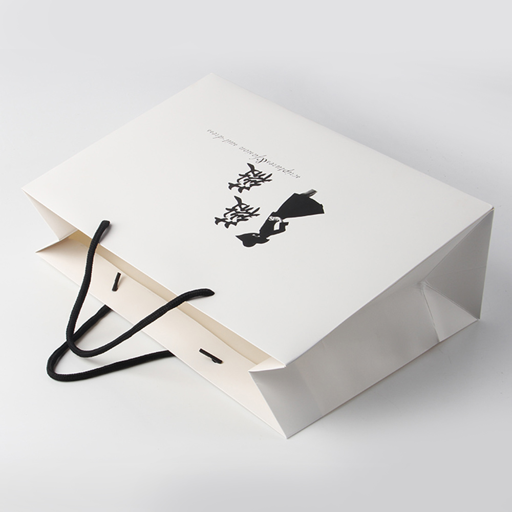 相機(jī)紙袋廠家對(duì)膠水有特別的處理見解 相機(jī)紙袋廠家對(duì)膠水有特別的處理見解